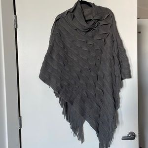 Knit asymmetrical poncho